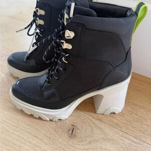 Sorel Black and White Lace-Up Boots with Neon Accents